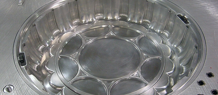 Design and Manufacturing of Form & Trim Tooling for an Oversized Deli Container Design and Manufacturing of Form & Trim Tooling for an Oversized Deli Container